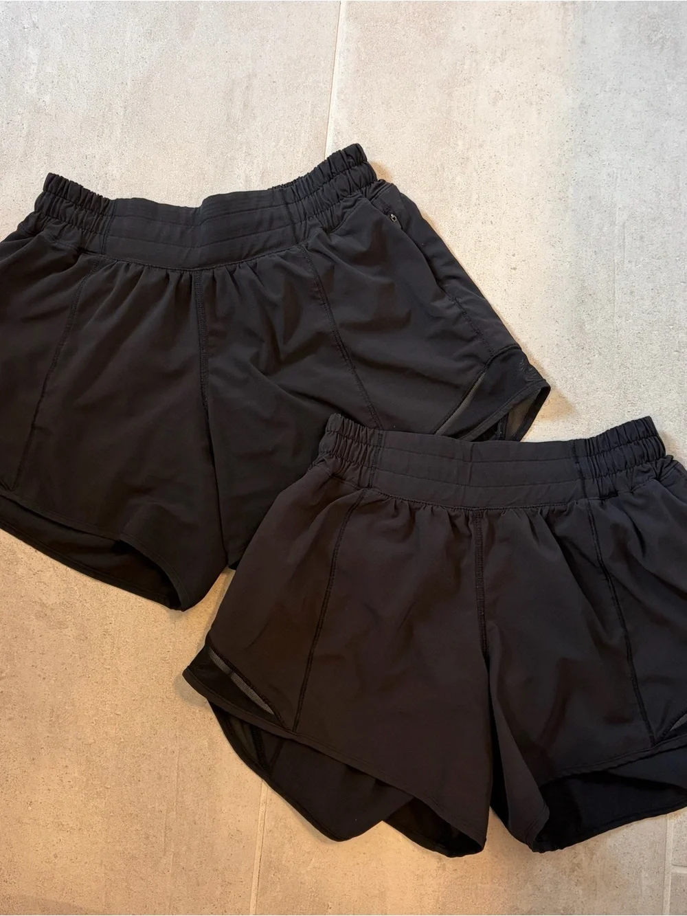 Lululemon Black Hotty Hot 4” low rise shorts — 2 PAIRS